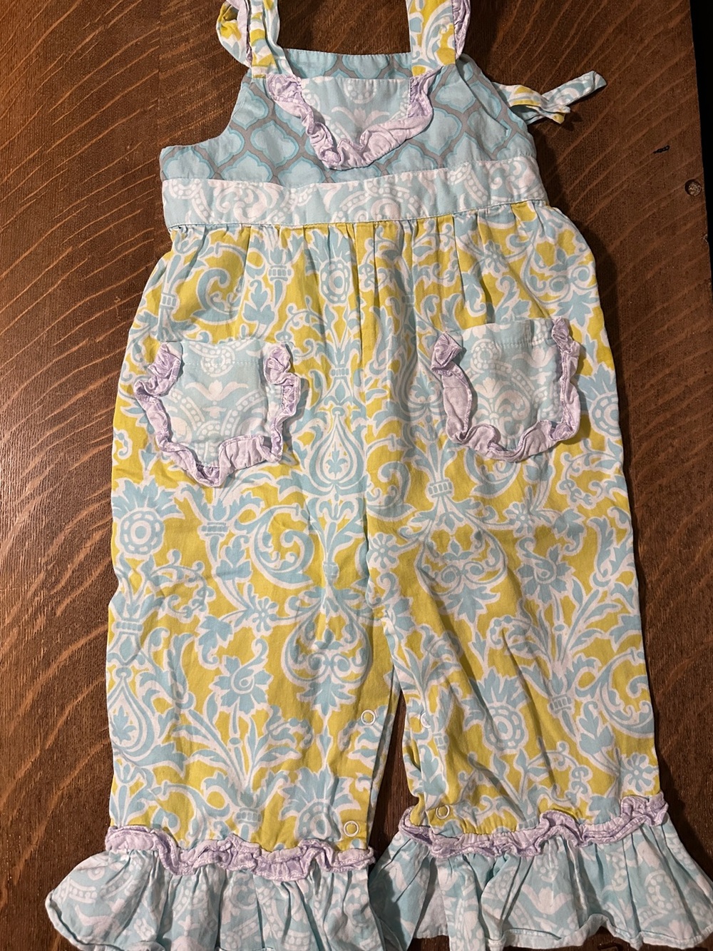 Pastel Yellow & Blue Girls' Ruffle One-Piece Romper